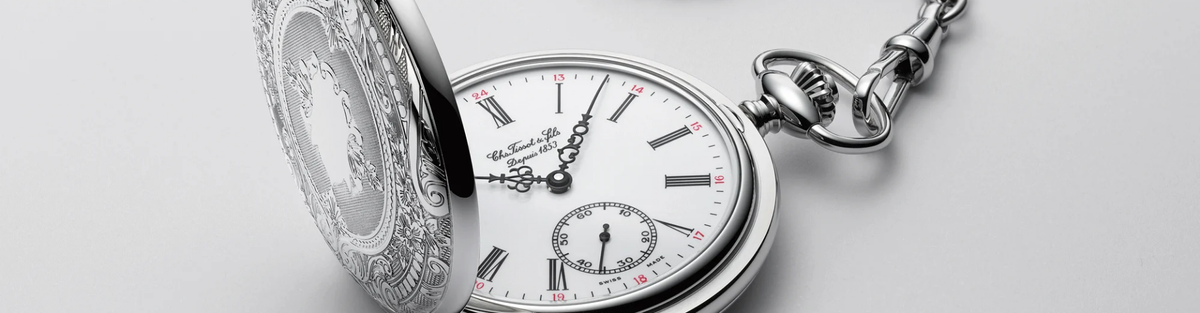 Tissot pocket watches with white dials and metal cases