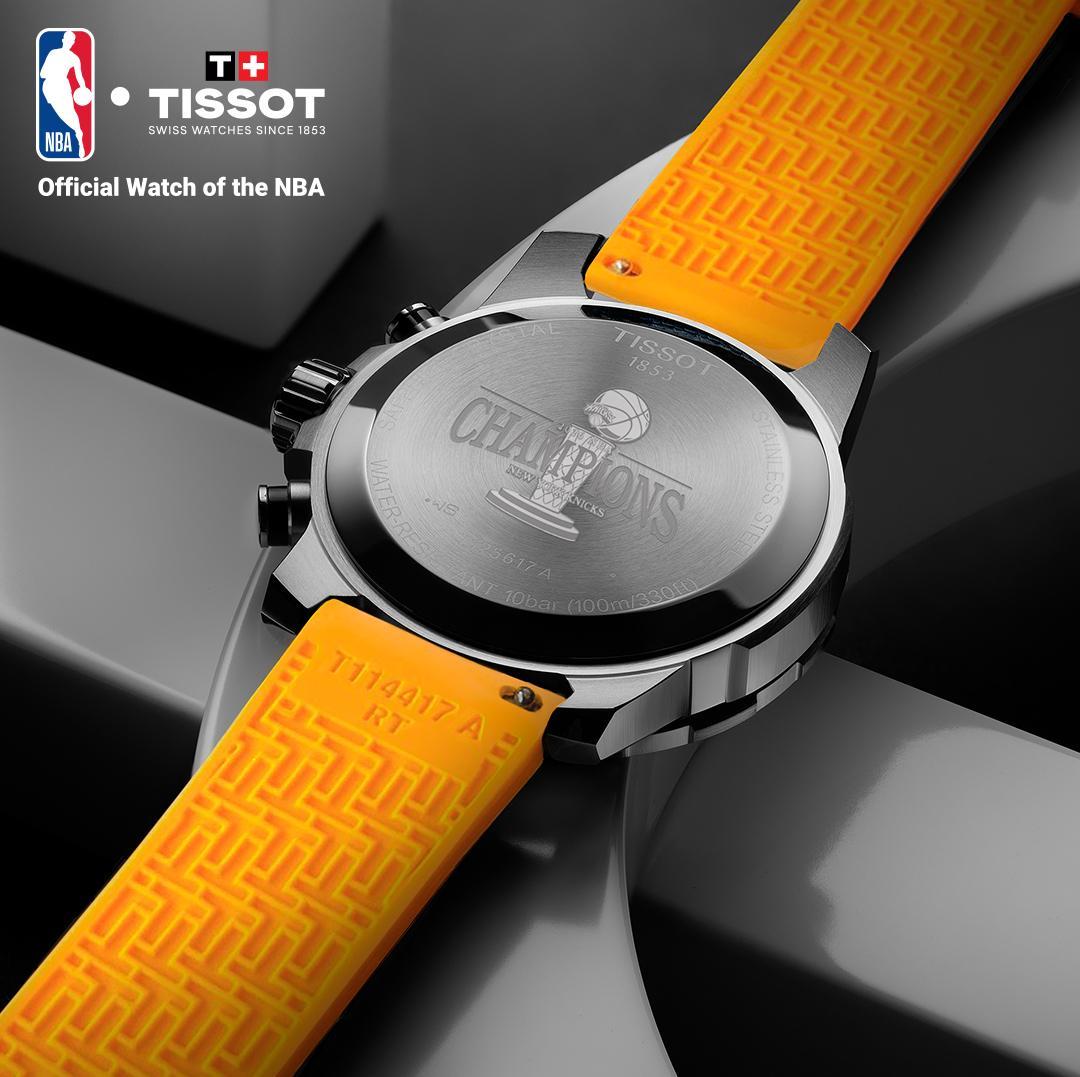Knicks championship engraved caseback with orange rubber strap
